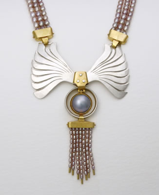 Commissioned winged necklace in silver and 22ct. gold with grey Marbé Pearl for Ann